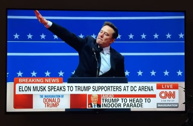 Elon making a 'Seig Heil' gesture at a rally